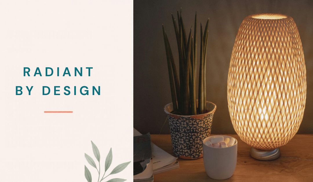 A woven bamboo lamp glowing warmly on a wooden nightstand beside a patterned plant pot and a mug of marshmallows.