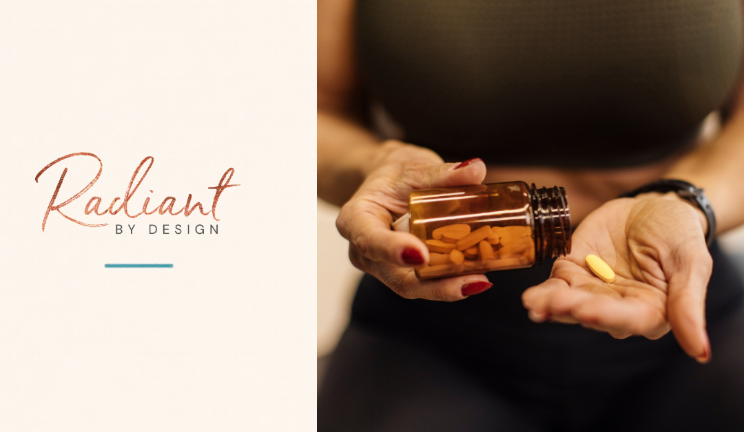 A woman pours a yellow supplement capsule from an amber bottle into her open palm.